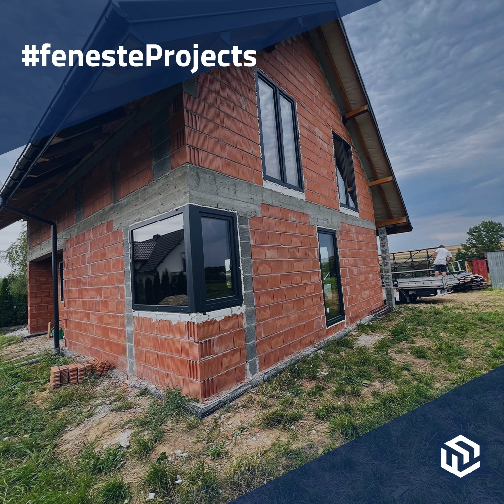 Einfamilienhaus mit schwarzen Fenstern am Rande der Stadt projekte fensterprofile pvc rehau  